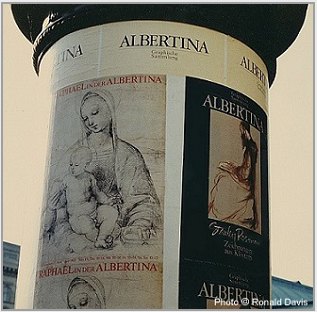 At the entrance to the Albertina, Vienna, the column displaying the posters announcing the museum's exhibitions "Raphael in der Albertina" and "Stanley Roseman - Zeichnungen aus Klstern," 1983.  Photo by Ronald Davis
